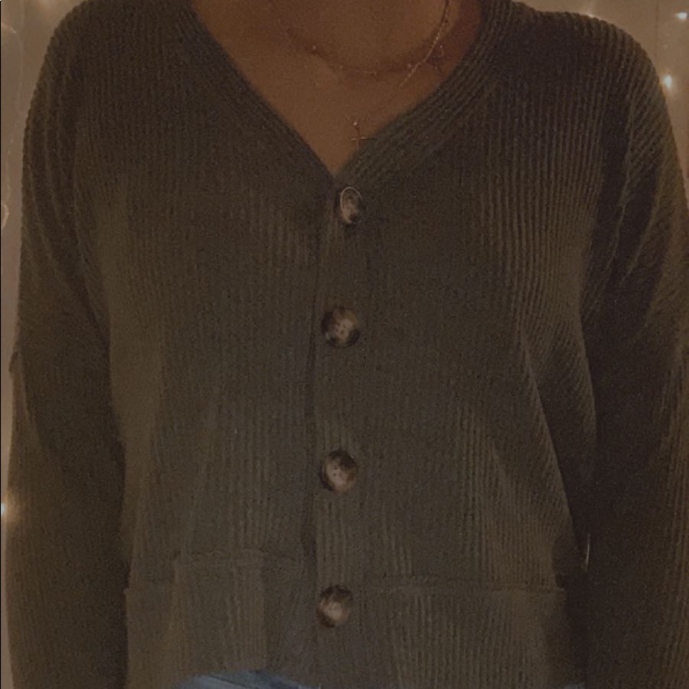 very cute green buttoned sweater!